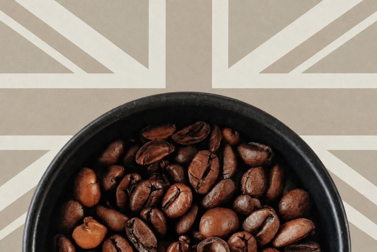UK specialty roasted cup of coffee beans with Union Jack in the background